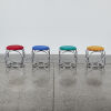 A Set Of Four Modernist Chrome And Fabric Stools