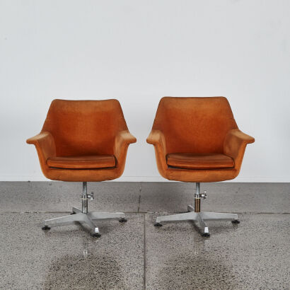 A Pair Of Retro Swivel Base Chairs