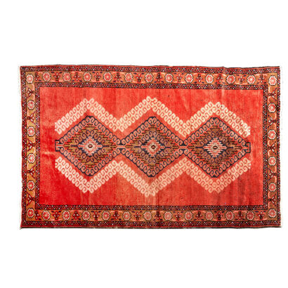 A Hand-Knotted Iranian Rug