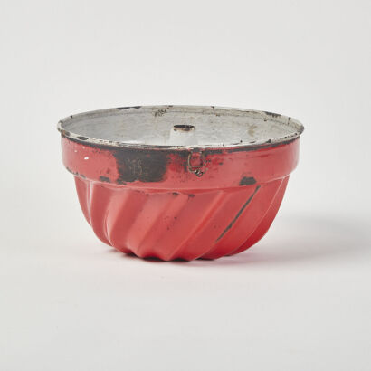 A Large Vintage Red Enamel Cake Mould