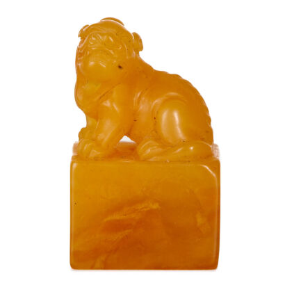 A Chinese Field-Yellow Stone Seal with carved auspicious beast knob