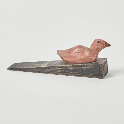 A Hand Made Folk Art Door Stop