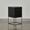 A Single Black Cubed Storage Unit - 2