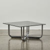 A Chrome And Smoked Glass Table - 2