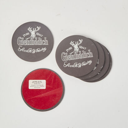 A Set Of Six Glenfiddich Scotch Whisky Slate Coasters