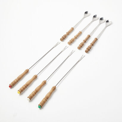 A Collection Of Four Fondue Forks And Four Fondue Spoons