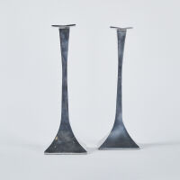 A Pair Of Tall Modernist Aluminium Candle Sticks