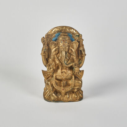 A Cast Metal Sculpture of Ganesh