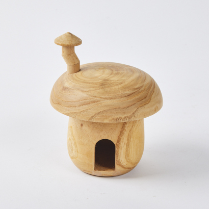 A Wood Sculpted Toadstool House