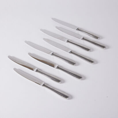 A Set Of Eight Cristoffle Acre Stainless Knives