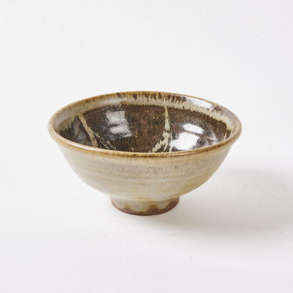 A Mirek Sm√≠≈°ek Small Bowl with a Sunflower Motif