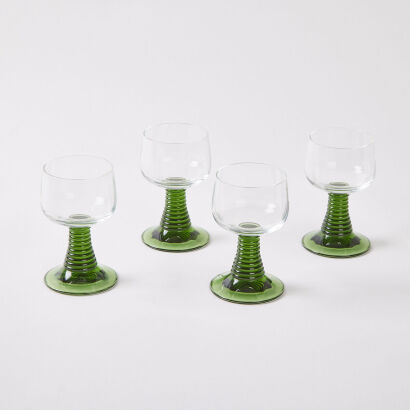 A Collection Of Four Beehive Stemmed Glasses