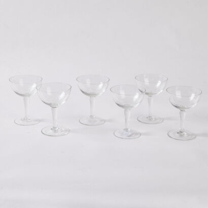 A Collection Of Six Etched Champagne Coups