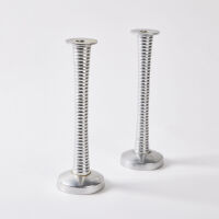 A Pair Of Tall Ribbed Aluminium Candle Sticks