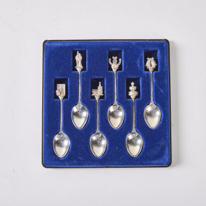 A Box Set Of Six Wedding Themed Silver Plated Teaspoons