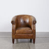 A Tan Leather Library Chair With Studded Detailing