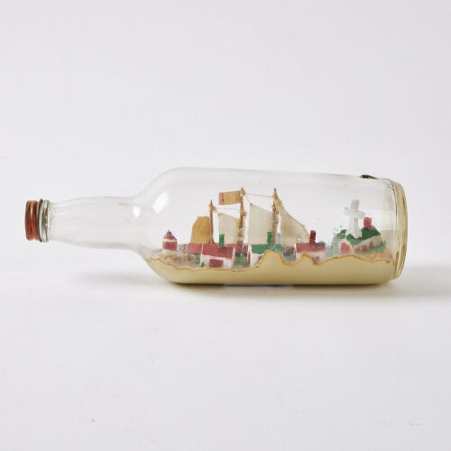 A Folk Art Ship In A Bottle