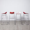 A Collection Of Four Calligaris Jam Bar Stools With Sled Base