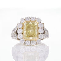 Platinum and 18ct Yellow Gold, 4.31ct Fancy Yellow Radiant Cut Diamond Ring