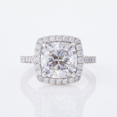 An Exceptional Platinum, Handmade, 4.00ct Cushion Cut /1.12ct Brilliant Cut Diamond Ring