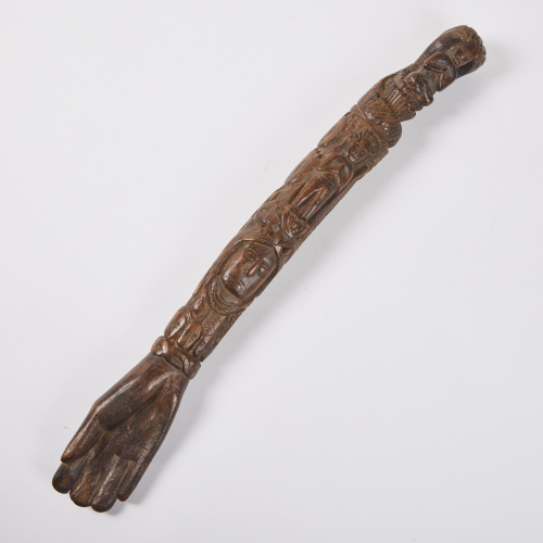 A Highly Detailed Carved Arm