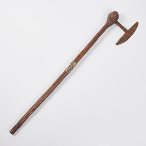 An Axe with a Wooden Handle