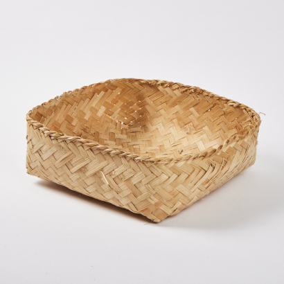 A Woven Basket with a Braided Rim