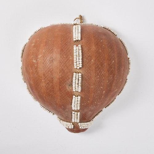 A Gourd Shell Decorated with Beads