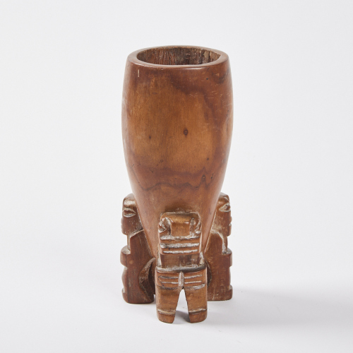 A Hawaiian Wooden Poi Vessel with Three Carved Gods 