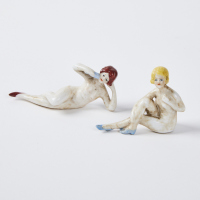 A Pair Of Ceramic Woman