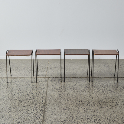 A Set of Four Wood Stools with Peg Legs