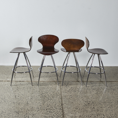 A Suite Of Four Designer Barstools In Curved Ply With Metal Base