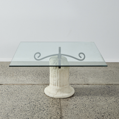 A Concrete Pillar Glass Top Coffee Table