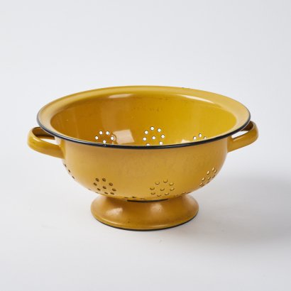 A Yellow Enamel Colander