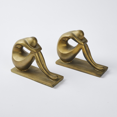 A Pair Of Figurative Bookends