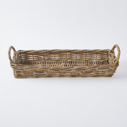 A Rectangular Wicker Basket With Handles