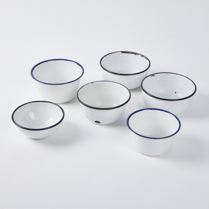 A Set Of Six Vintage White Enamel Bowls