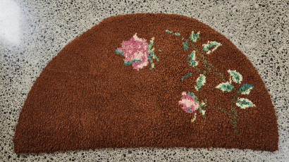 A Semi-Circular Rug with Rose Motif