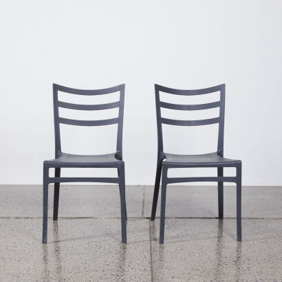 A Pair Of Grey Modern Design Chairs