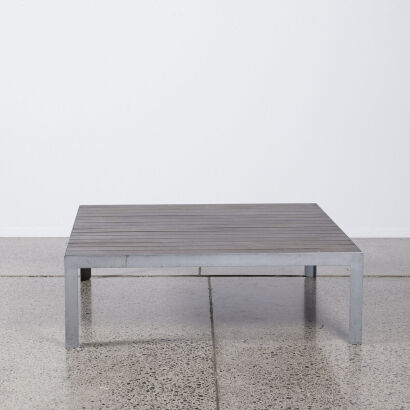 A Minimal Slatted Coffee Table With Metal Base