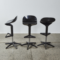 A Set Of Three Kartell Spoon Stools