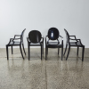 A Set Of Four Kartell Ghost Chairs