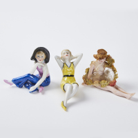 A Trio Of Ceramic Woman