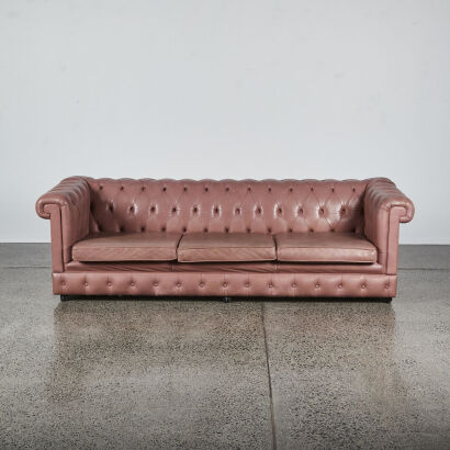 A large three seater Chesterfield sofa