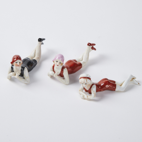 A Trio Of Ceramic Bathing Woman