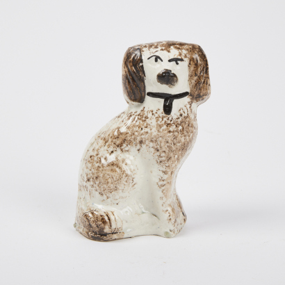 A Miniature Antique Staffordshire Dog