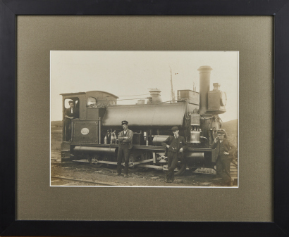 A Photograph of Men and a Train