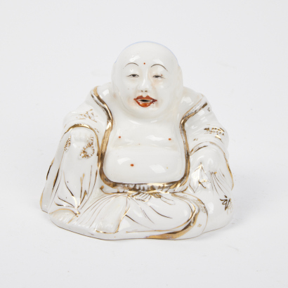 A Porcelain and Gilt Buddha