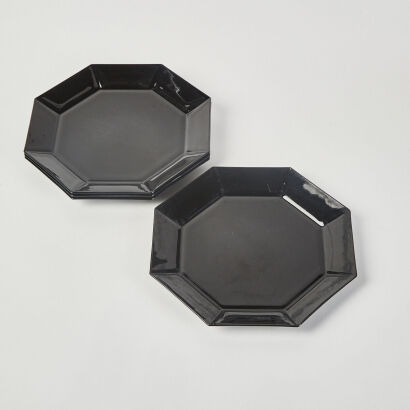 A Set Of Four Black French Hexagonal Dinner Plates