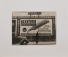 A Photograph of a Billboard Advertising Texaco